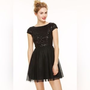 Glamorous and rock & roll style black sparkly and tulle dress